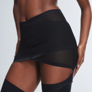 SHOW N' TELL MESH GARTER SKIRT