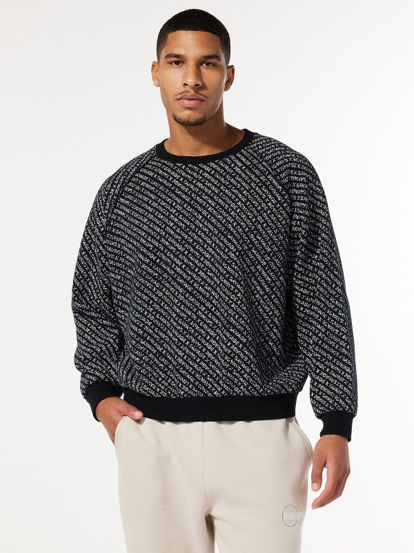 XSSENTIAL-STACKED-MONOGRAM-RAGLAN-CREWNECK-SWEATSHIRT-SB2457670-8777-1-1200x1600-1.jpg