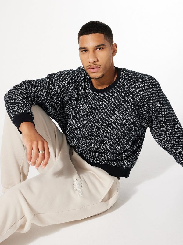 XSSENTIAL-STACKED-MONOGRAM-RAGLAN-CREWNECK-SWEATSHIRT-SB2457670-8777-6-1200x1600-1.jpg